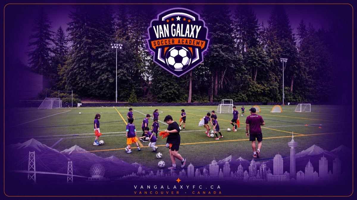 A training session on the pitch framed by tall evergreens